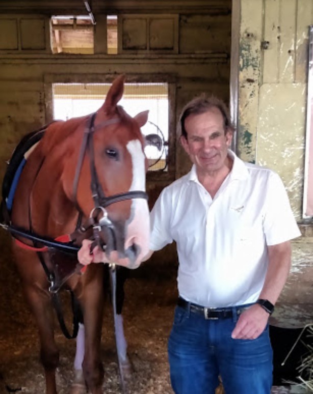 Ed Swyer with a horse